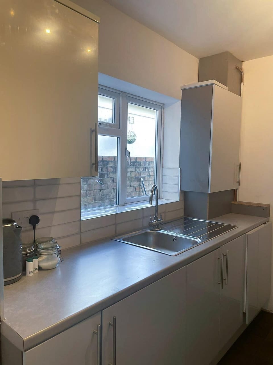 Kitchen with Kettle, Tea, Coffee and Sugar
