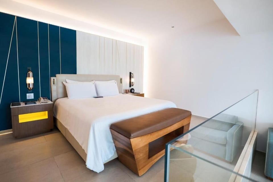 Unwind in crisp linens and modern, calming design details.