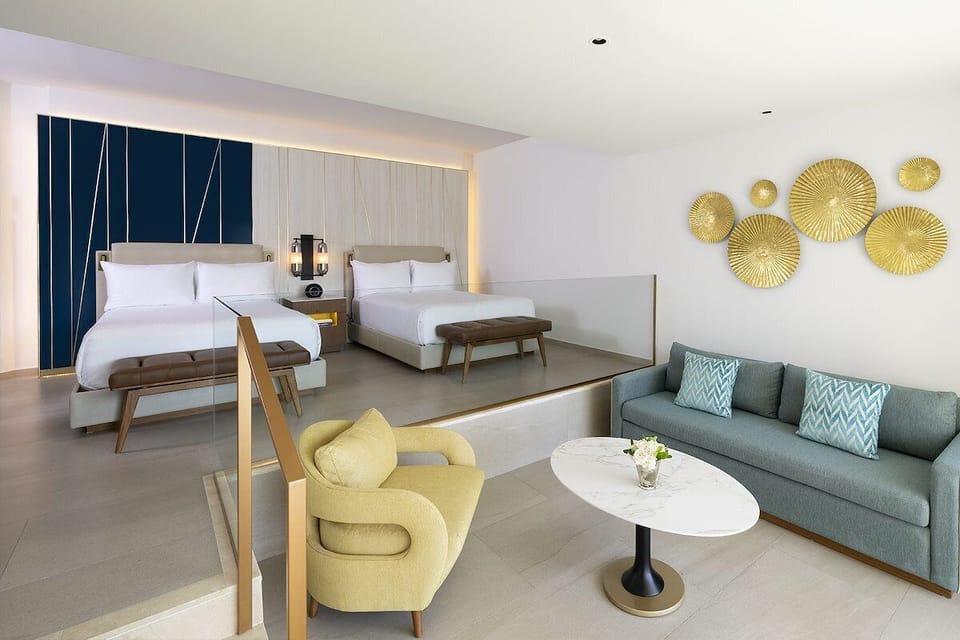 Dive into dazzling entertainment under dramatic, colorful ceiling lights.