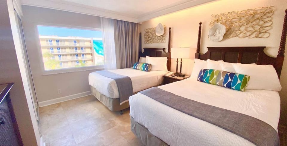 Unit with 2 Double size beds. Exact unit will be assigned upon arrival. Views, colors and decor may vary.