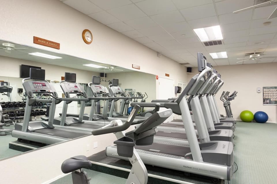 Keep your routine energized in the bright, well-equipped fitness room.