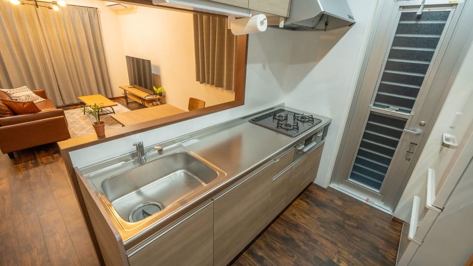 The kitchen is spacious and you can cook your own meals.