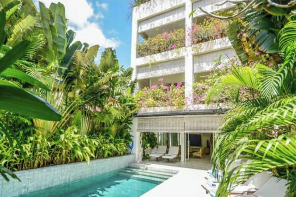 Each bedroom has its own personal balcony looking over the pool. All getting plenty of sun.