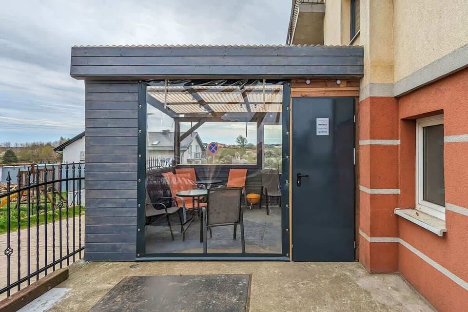 Furnished, enclosed terrace/patio.