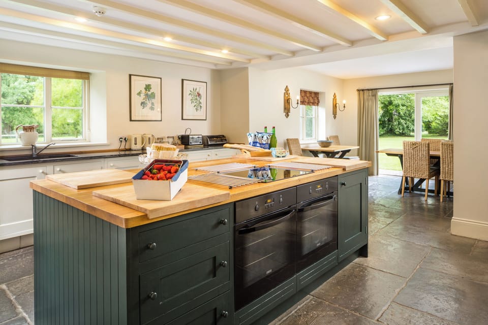 Great working kitchen geared up for catering and  numbers and adjacent to dining