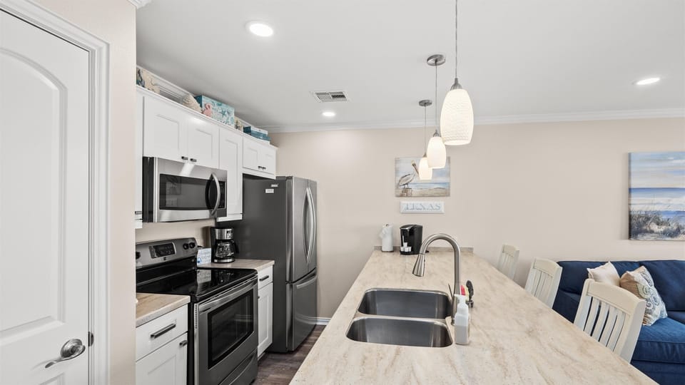 Cute coastal accessories adorn this cute beach condo.