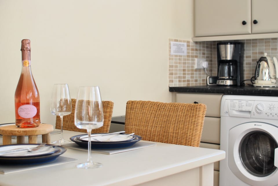 The dining kitchen is modern in style