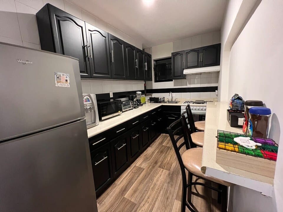 The kitchen also features a breakfast bar