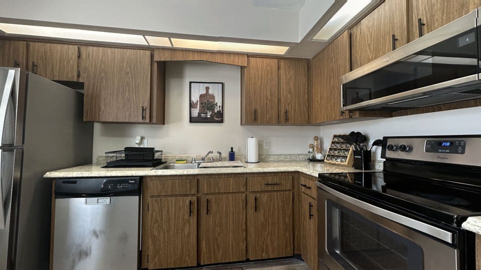 Stainless Steel appliances, Coffee Station, cookware, and more amenities.
