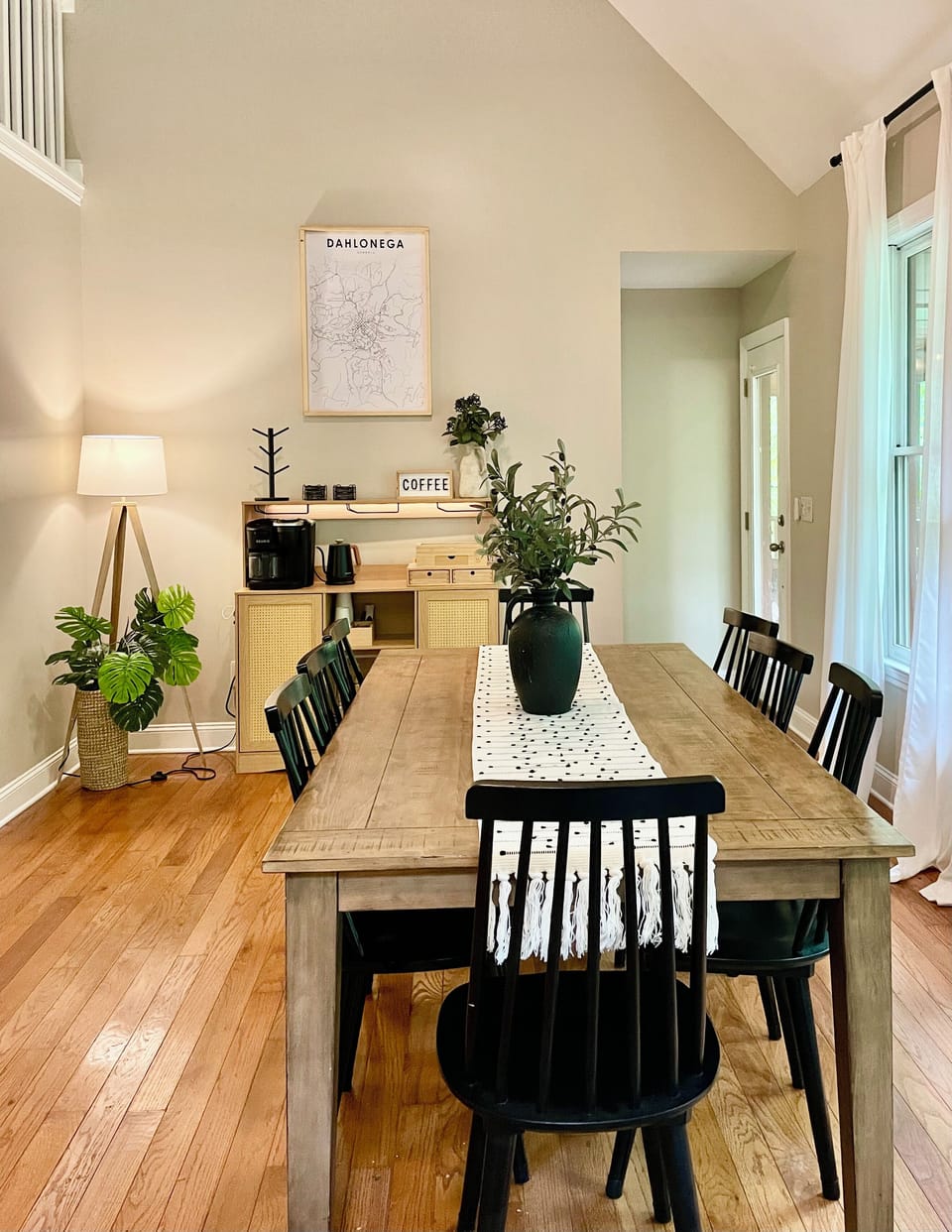 Enjoy a meal at our 8 seater dining table.