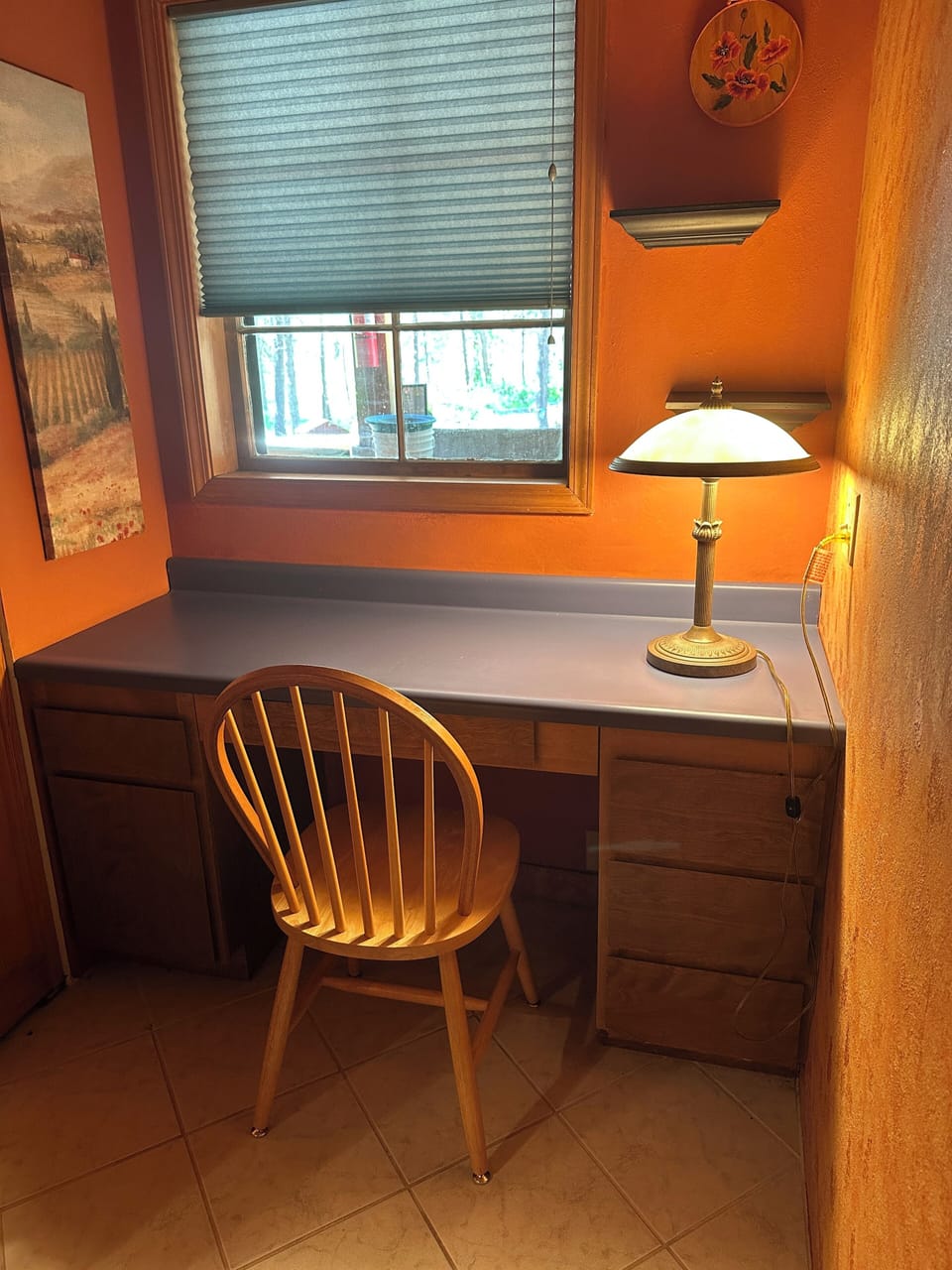Desk in lower level twin bedroom next to Den and laundry exit to picnic table
