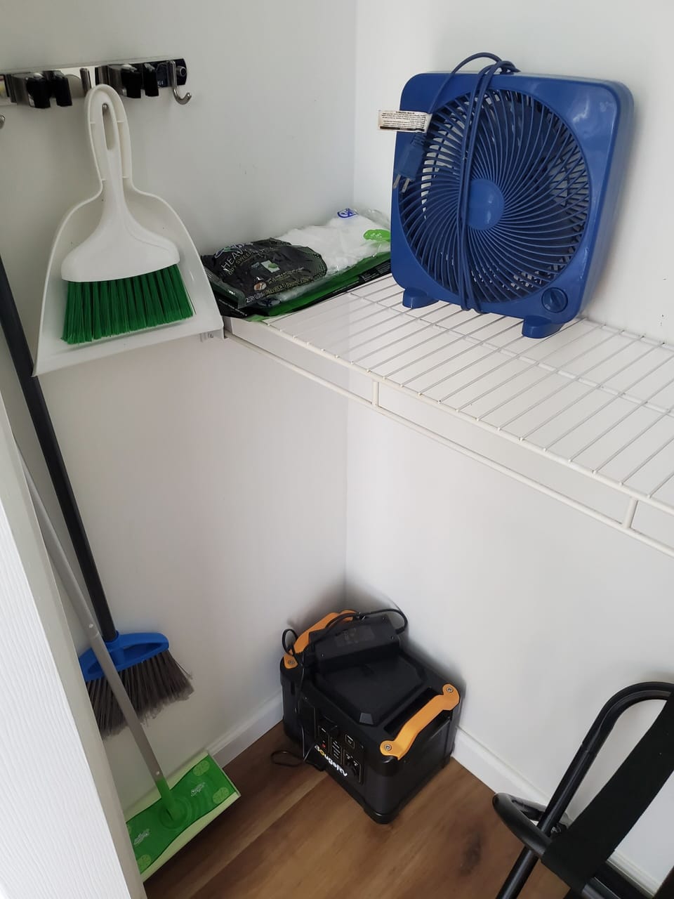 2nd bedroom closet, basic cleaning supplies and a Bouge RV power supply.