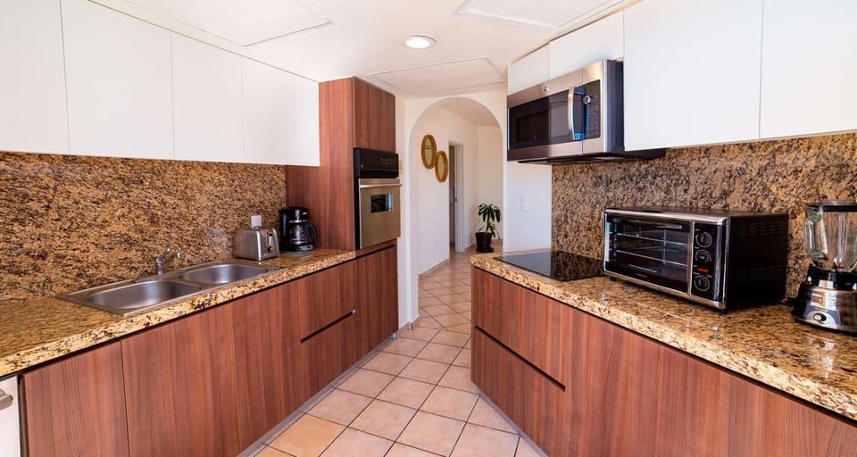 Fully-equipped kitchen suite for culinary adventures at Villa del Palmar.