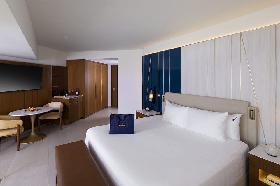Unwind in a spacious suite with cozy seating nook.