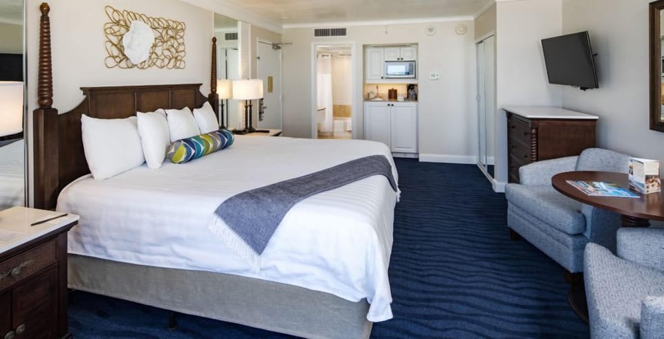 Recharge in crisp linens with everything you need nearby.