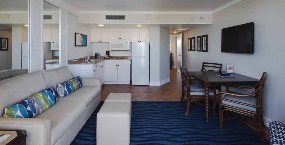 Settle in with a full kitchen and easy dining space.