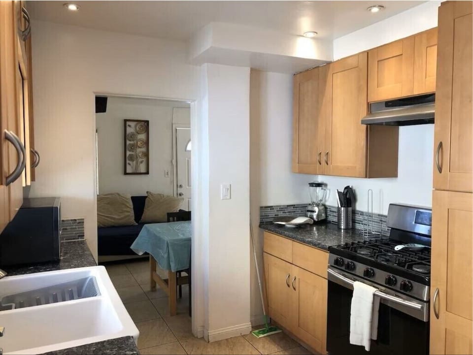 Kitchen is roomy, has all major and minor appliances and has nice double sink