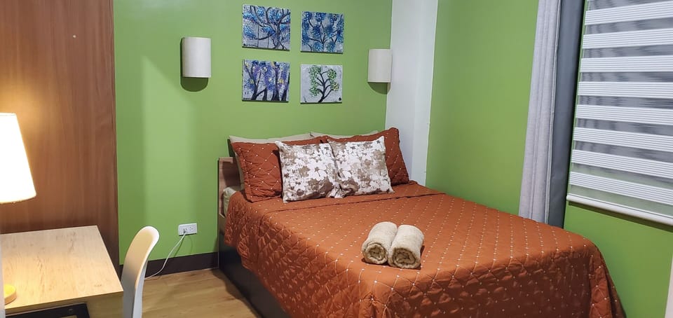 Same bedroom with different bedding set.