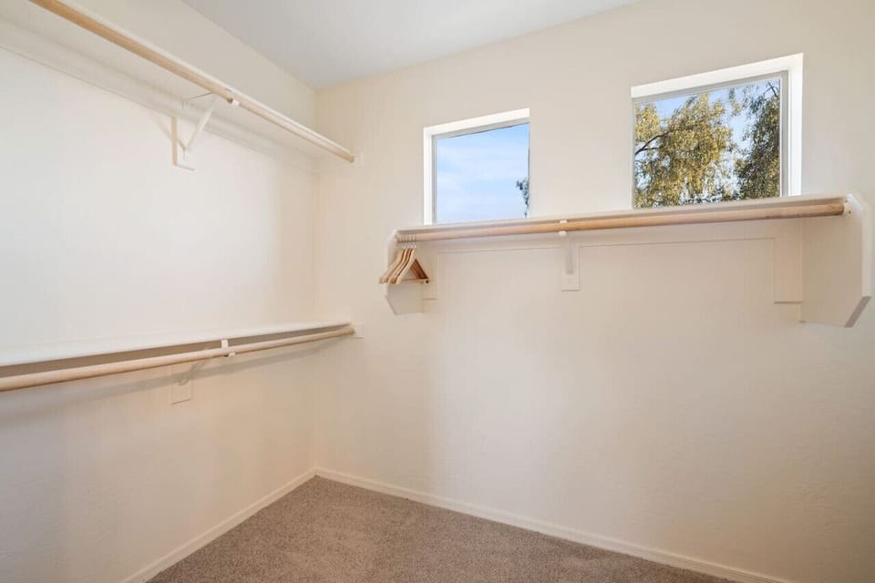Spacious walk-in closet with ample storage space, perfect for keeping your belongings organized during your stay.
