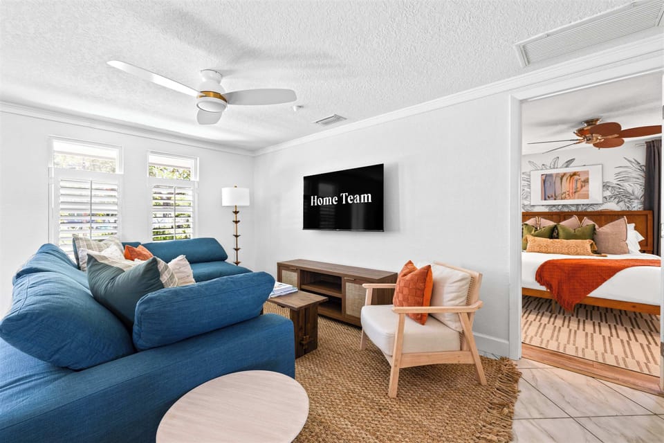 Sit Back & Relax – A warm and welcoming living area with plush seating and a cozy atmosphere.
