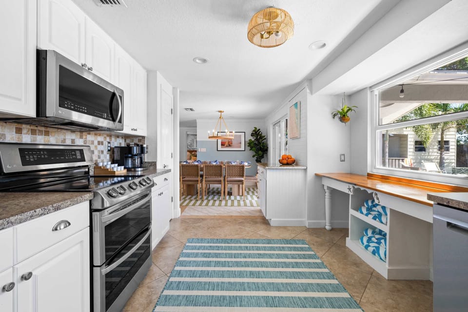 Cook in Style – This kitchen features high-end appliances, ample storage, and everything you need for a seamless culinary experience.