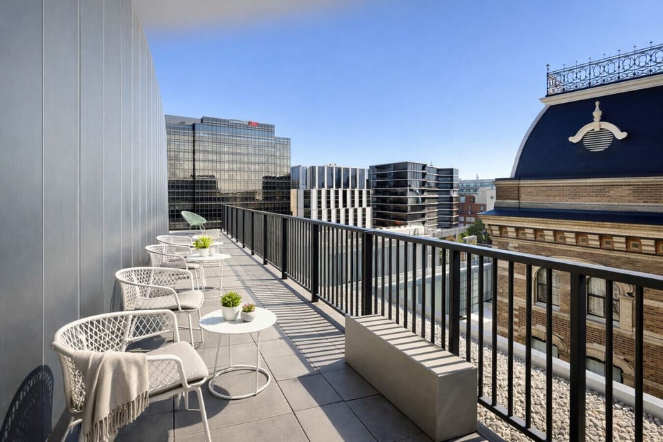 Enjoy a drink on the shared rooftop looking over the old Yorkshire Brewery Tower