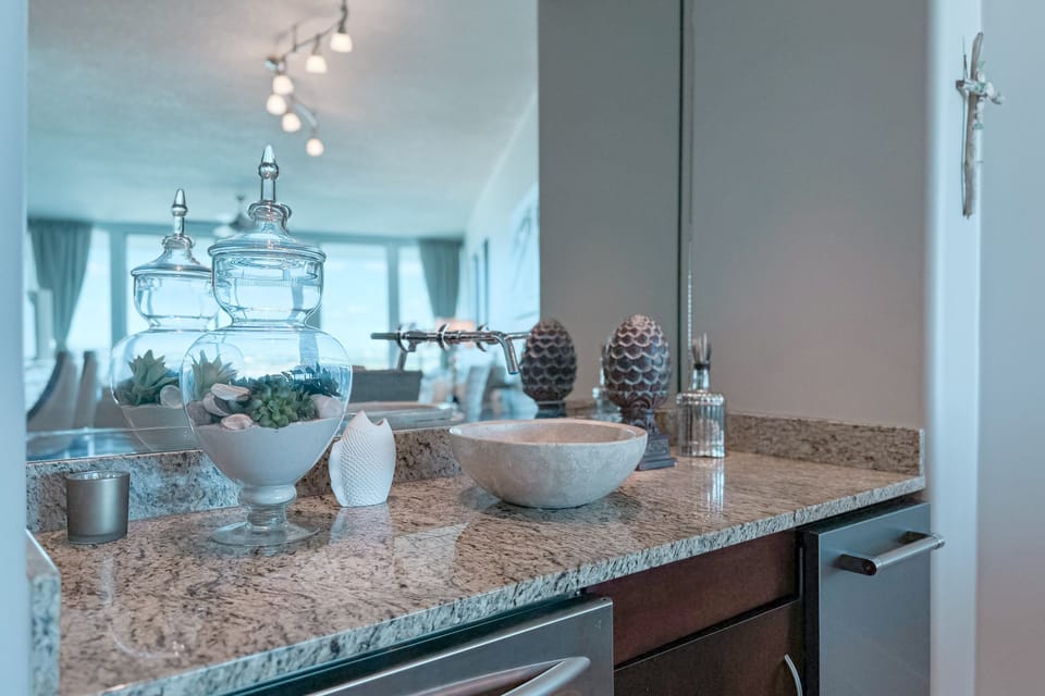 Seamlessly integrated dining and wet bar area, ideal for hosting guests. The open layout and modern amenities create a welcoming and functional space for dining and socializing.