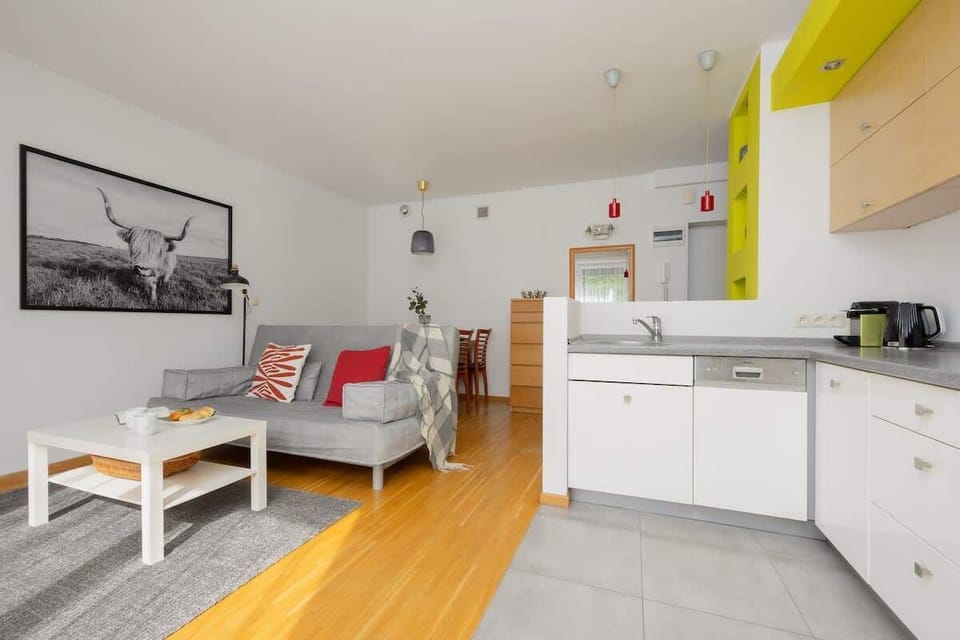 Enjoy your favorite shows on the flat-screen television in the elegant living area.