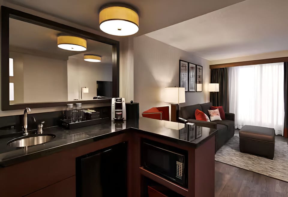Enjoy quick bites and fresh coffee from your in-room kitchenette.