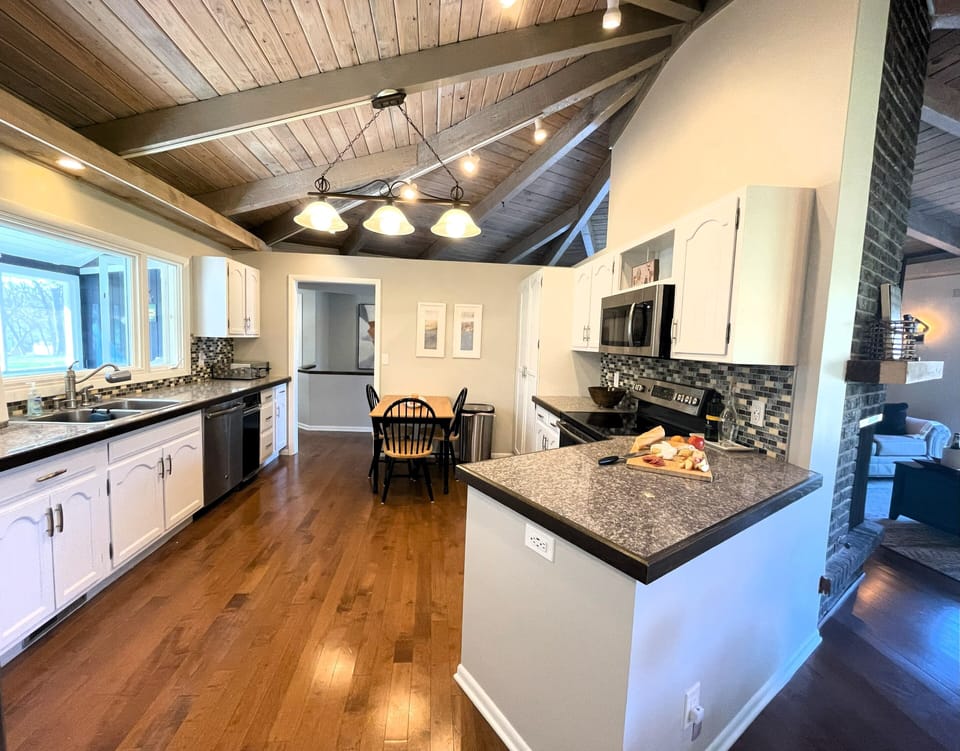 Full Kitchen- Sink overlooks Screened in Porch