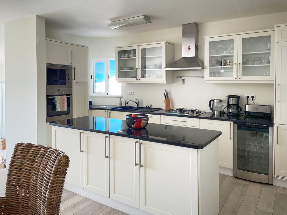 Open and fully equipped kitchen 