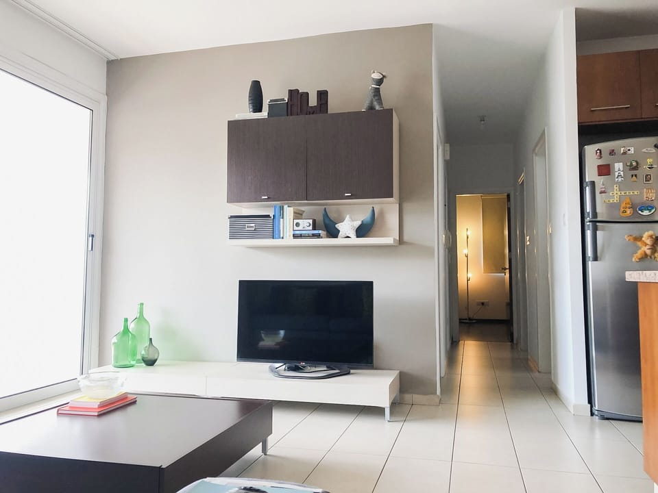 Our living room, a perfect blend of comfort and sophistication.