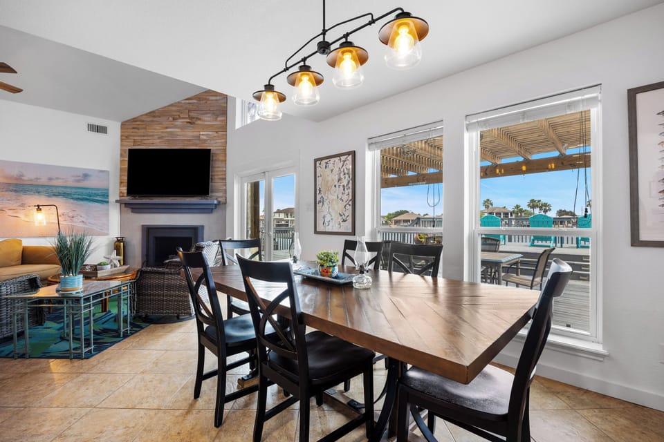 Dining area with seating for six with a lovely view of  the canal