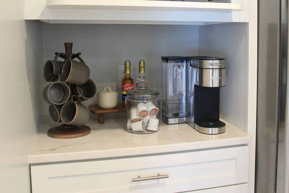 Enjoy your morning brew at our convenient coffee bar, perfect for a fresh start.