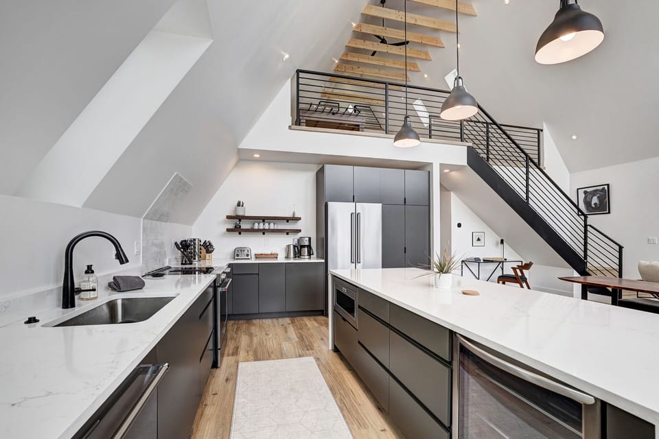 Fully stocked kitchen, includes custom built in microwave and beverage storage