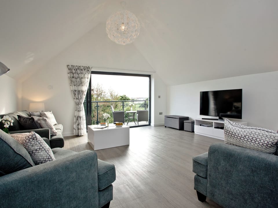 Stylish living area with balcony access | Black Sea Horse, Westward Ho!