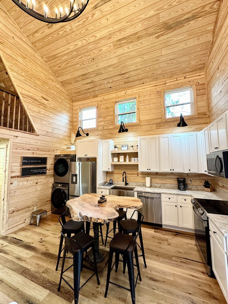 Kitchen equipped with plenty of cabinets and full stainless steel appliances