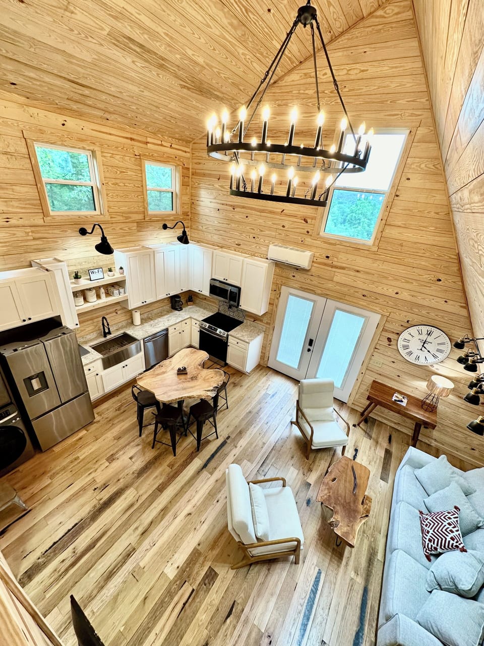 Vaulted main space boasts open concept to enjoy time together.