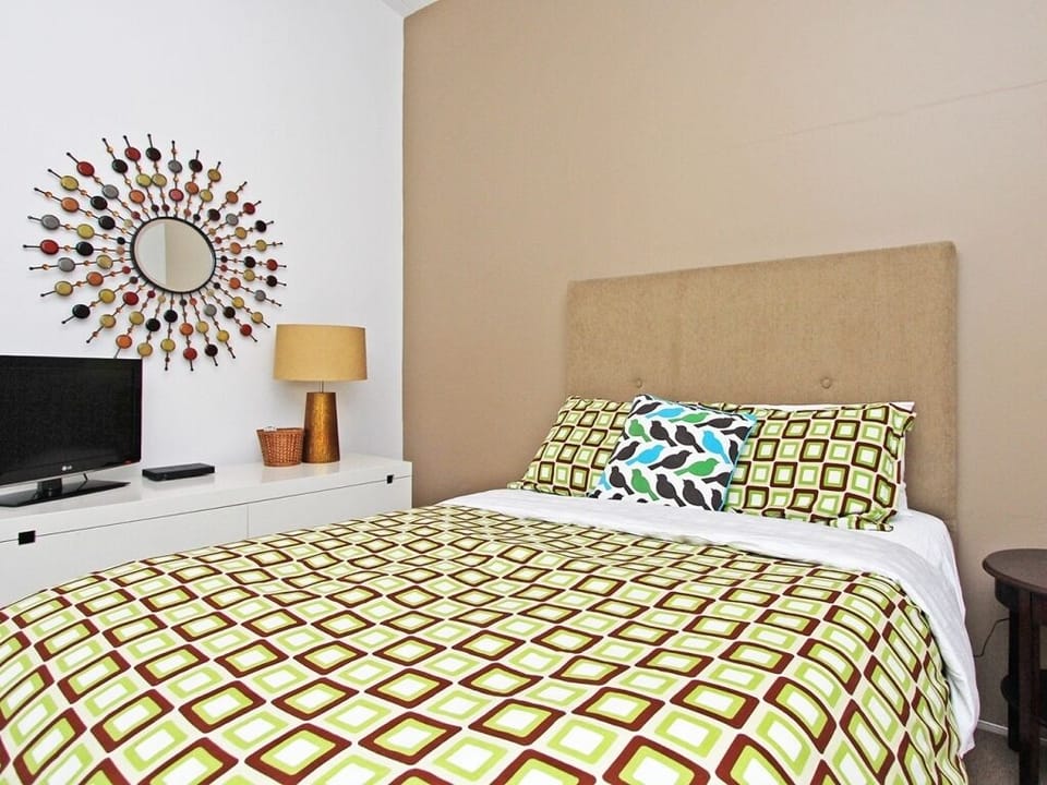 2nd bedroom has a queen bed and is across from guest bathroom.