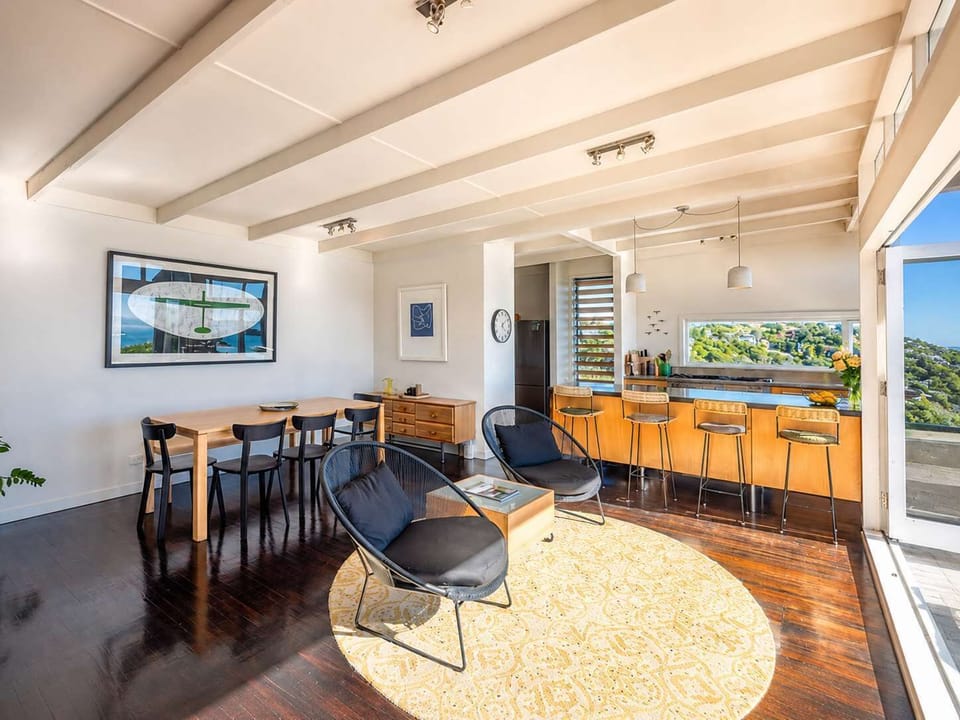 Open plan living - view opens up to the deck with ocean views