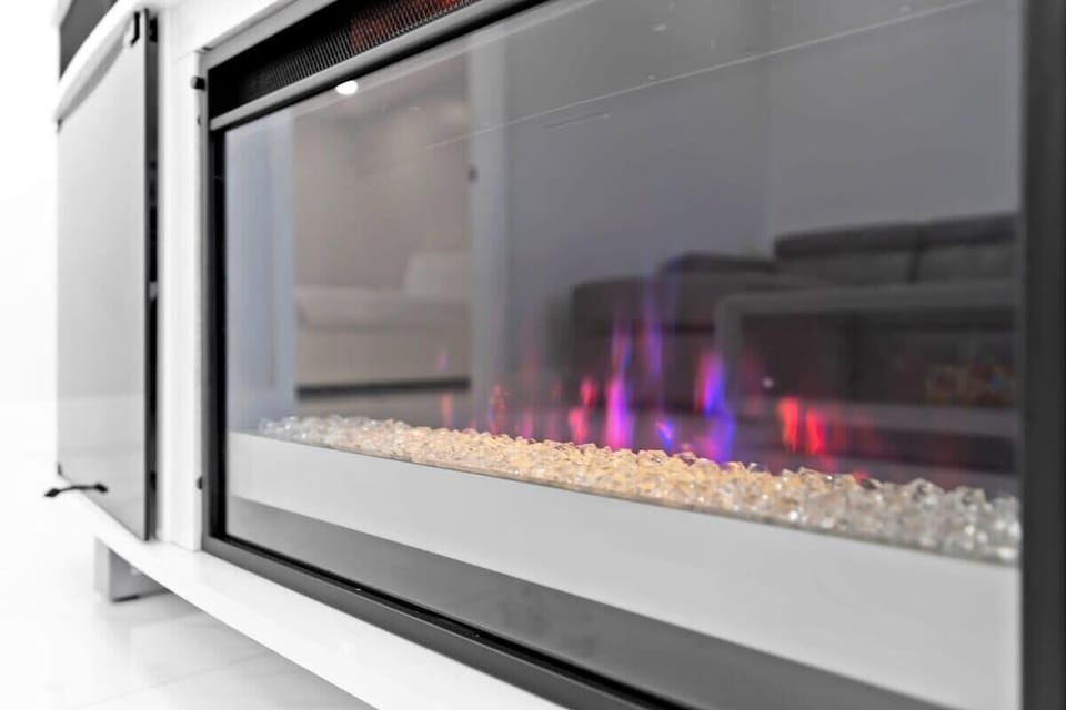 Sleek electric fireplace with vibrant flames