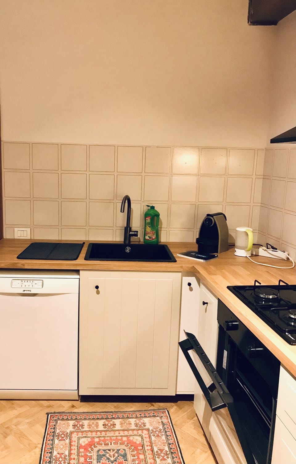 Newly refurbished kitchen with dishwasher, oven, fridge, freezer, coffee maching