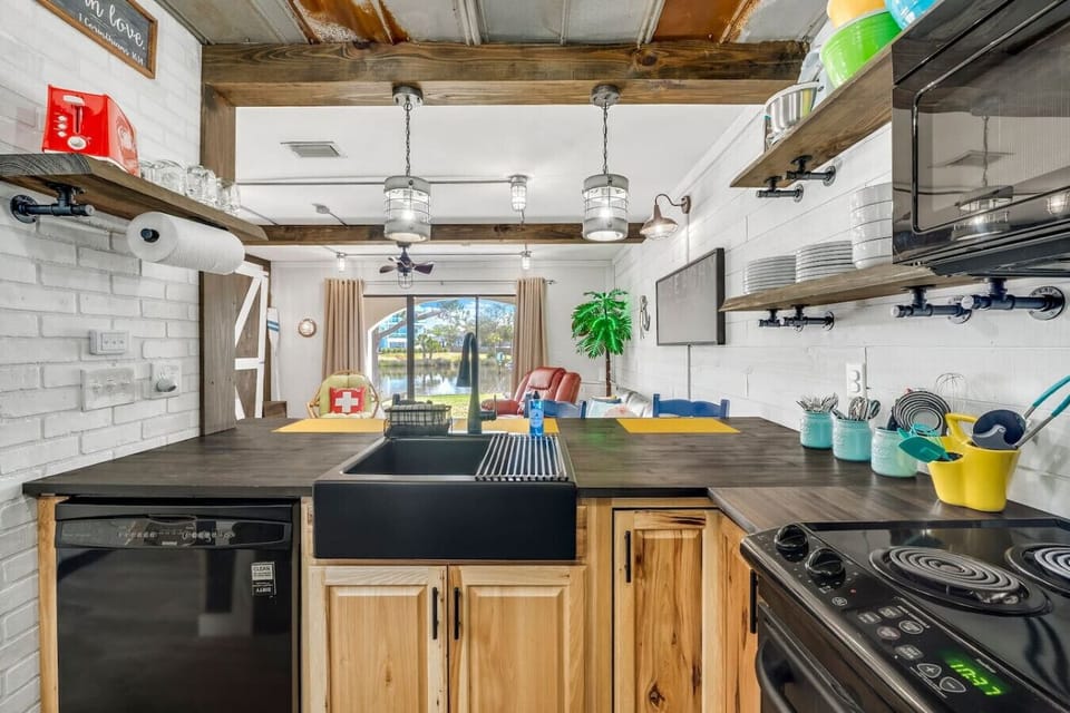 Fully Stocked Kitchen with Bar Seating