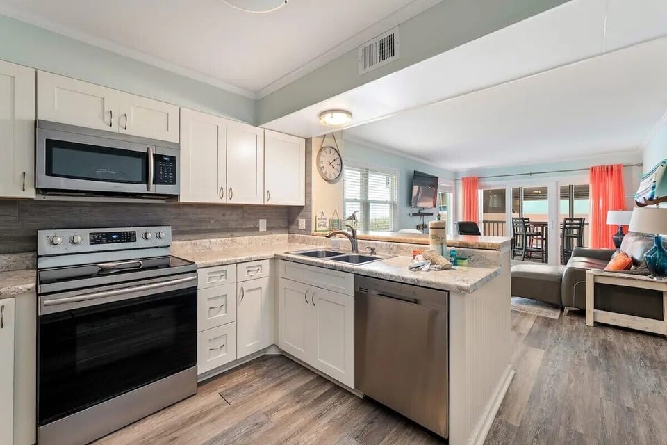 Open kitchen and living area designed for comfort and connection.