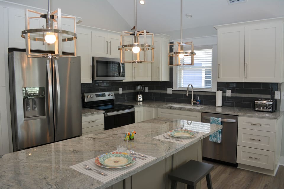 Kitchen for dining in and large enough for multiple cooks