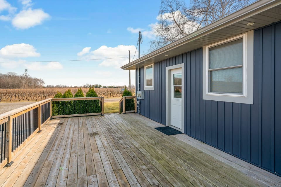 Side deck with guest keyless entry, bbq, & 6 seater outdoor table (not pictured)