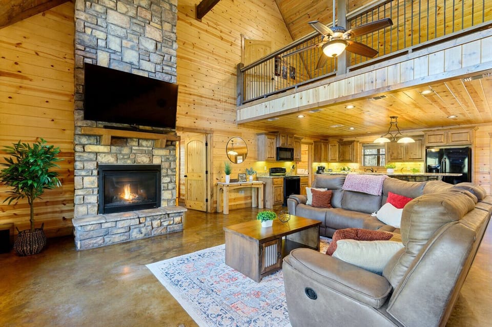 Open sightlines from the kitchen across to the fireplace lounge keep cooks and conversation connected.