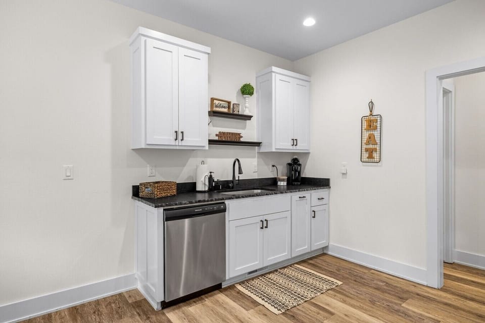 Ample counter space and quality fixtures for group cooking.