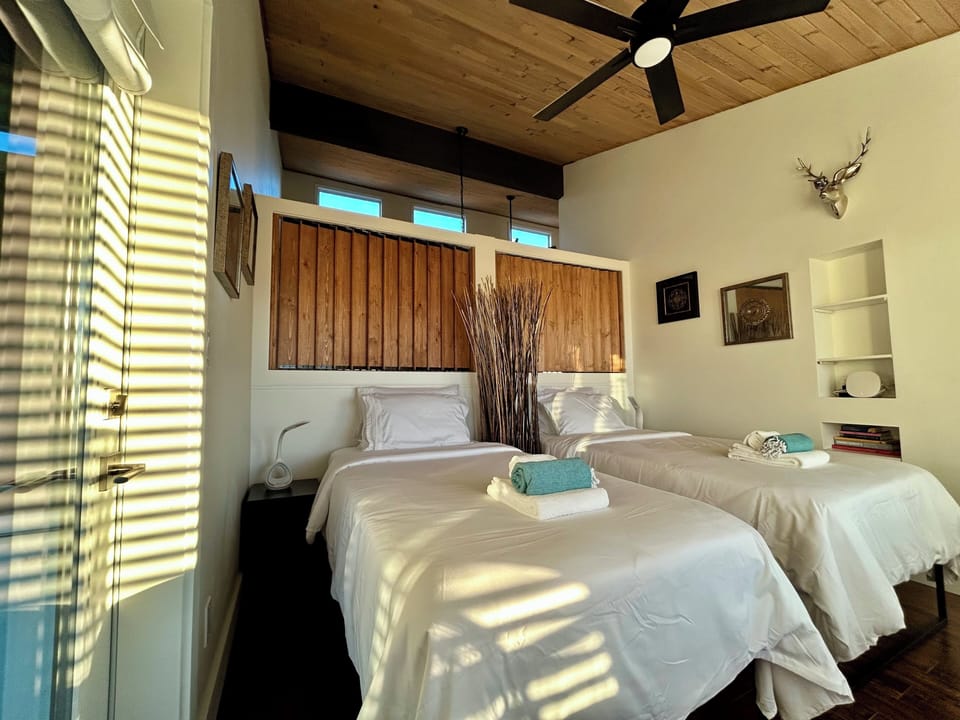Den converted to bedroom with privacy panels