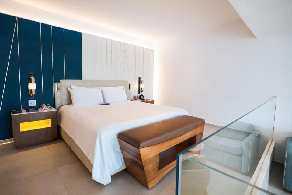 Enjoy a spa-like bathroom with sleek finishes and plush robes.